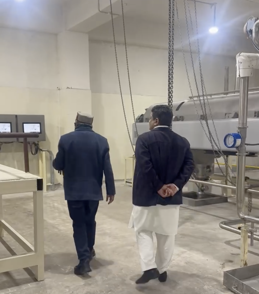 MahaVastu Expert advising in a factory